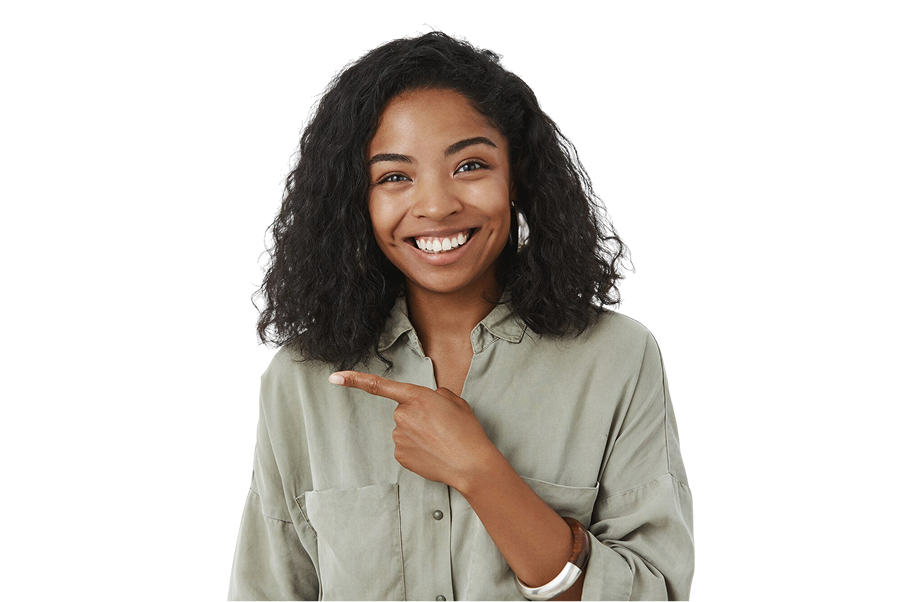 waist up amused friendly looking charming dark skinned woman with curly hairstyle grey shirt pointing left smiling joyfully 1 1 - Dr. Tim Silegy OMFS